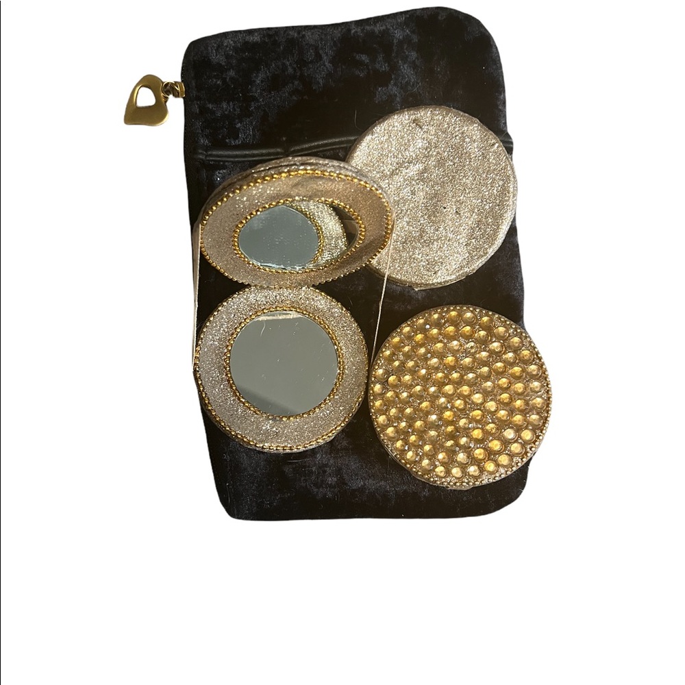 3 small mirror compacts and 1 small velvet clutch